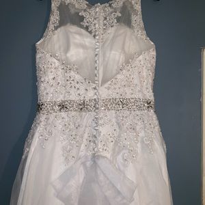 Brand new wedding gown with tags. Size 12